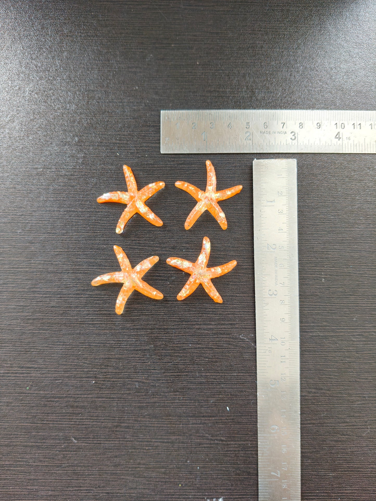 MN237- Orange jelly starfish miniature